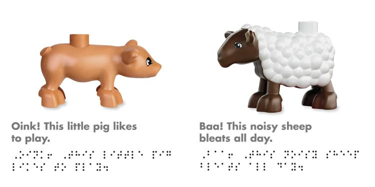 Toy pig and sheep figures with descriptive text and braille on a white background