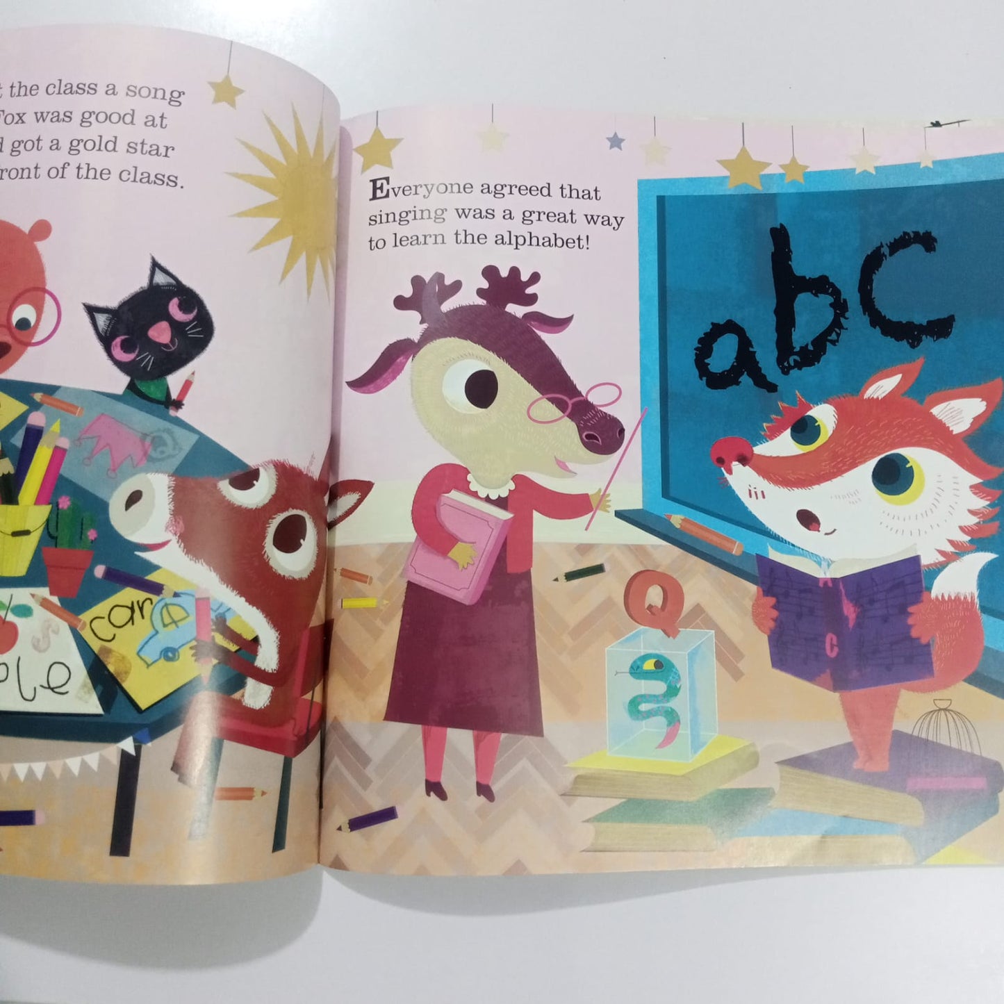 First day at SCHOOL', featuring illustrations of various animals and school-related items.