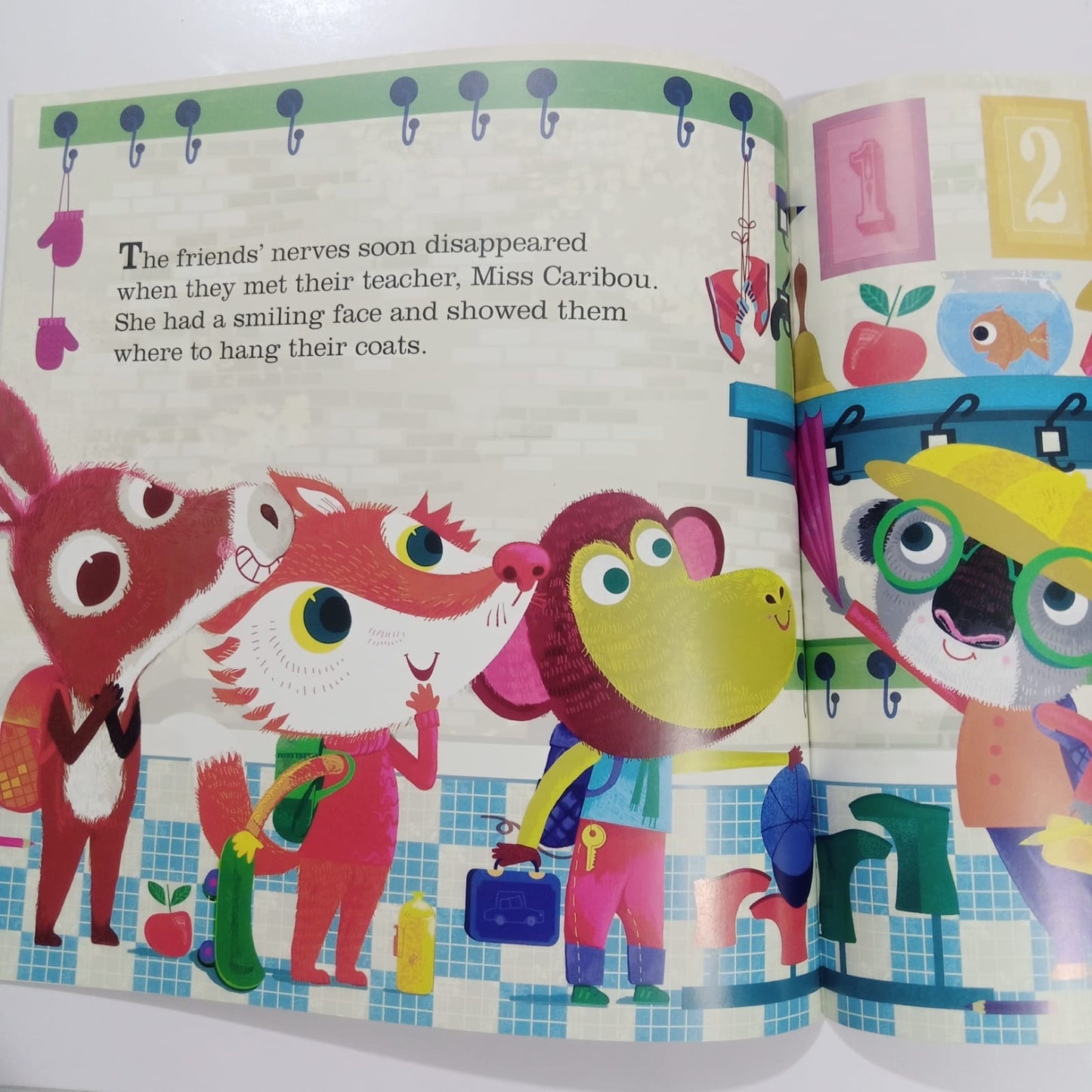 First day at SCHOOL', featuring illustrations of various animals and school