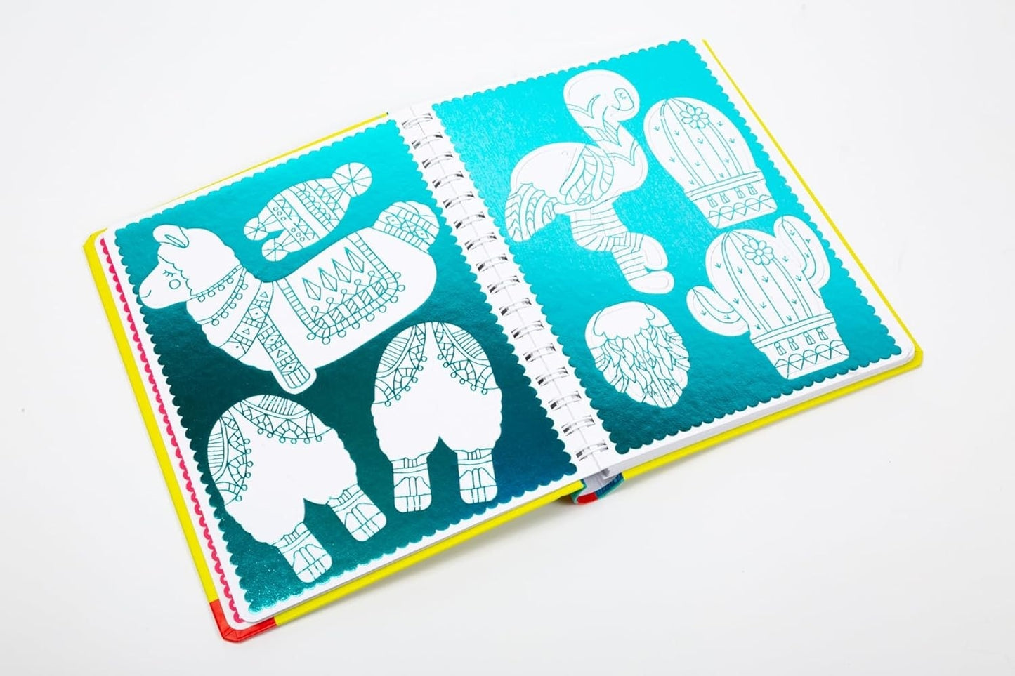 Open book with illustrations of animals on a white background
