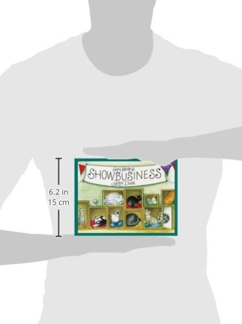 Card game box labeled 'Showbusiness' held by a mannequin against a white background