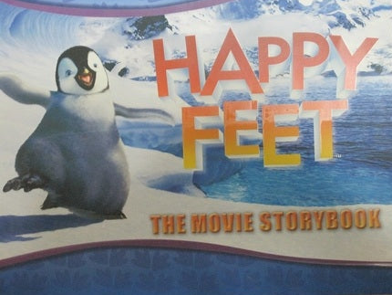 Happy Feet movie storybook cover with a penguin illustration