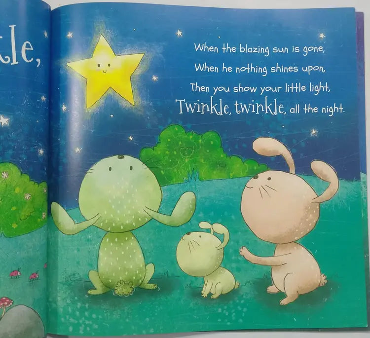 Illustrated book page with star, frog, and rabbit characters against a night sky.